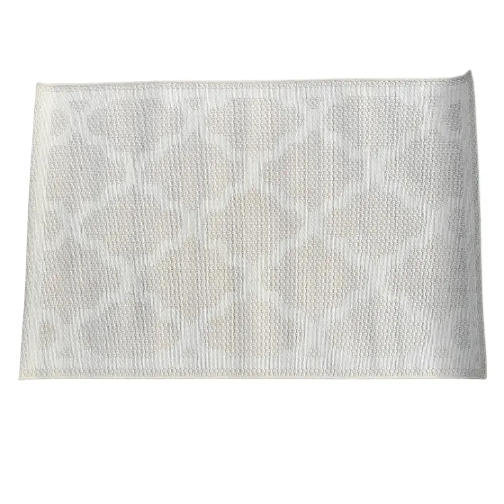 Location Tapis tissé beige avec motifs géométriques