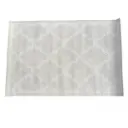 Location Tapis tissé beige avec motifs géométriques