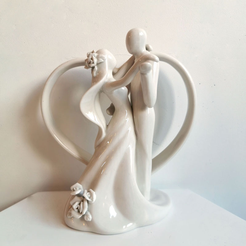 Location Couple et coeur en porcelaine