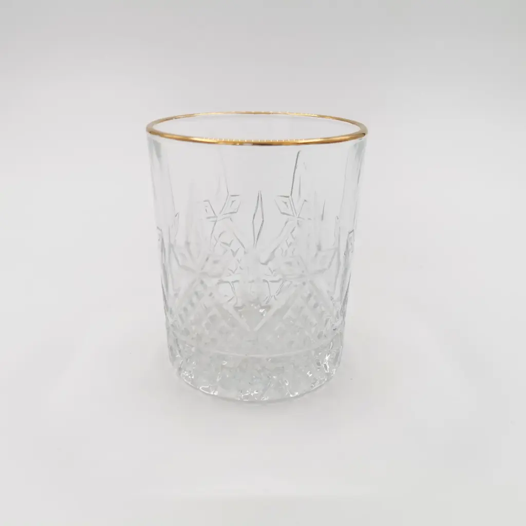 Location Verre à motifs gravés et bord doré